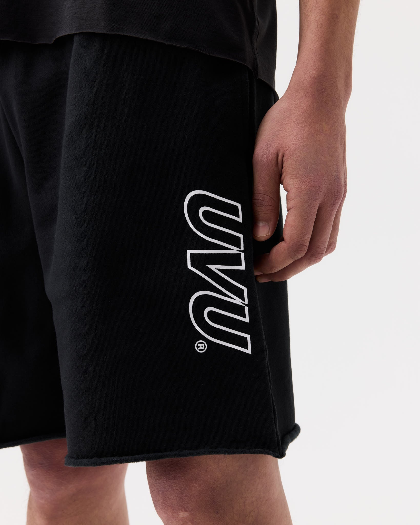 OUTLINE CUT-OFF SWEATPANTS
