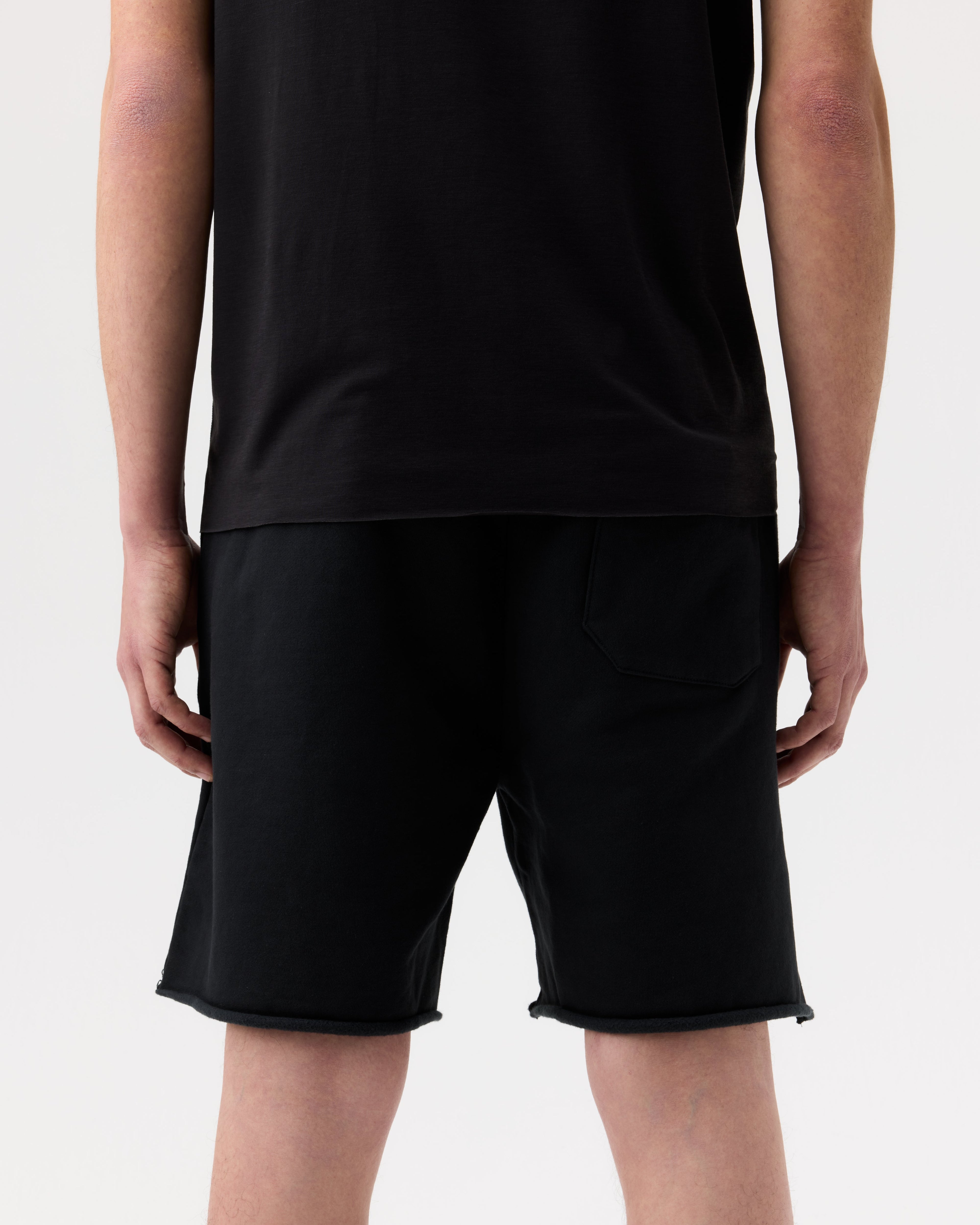 OUTLINE CUT-OFF SWEATPANTS